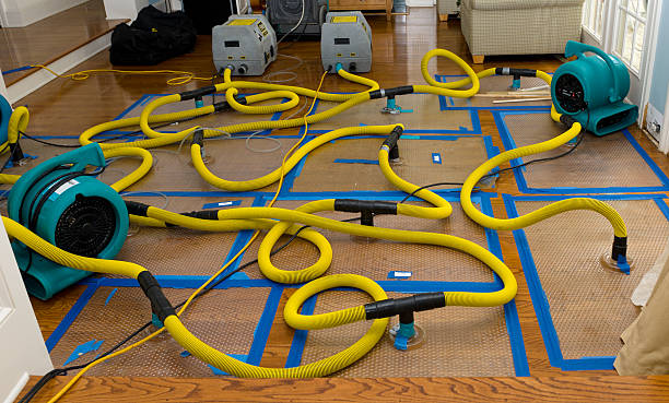 Professional Water Damage Restoration technician working in Fayetteville, NC